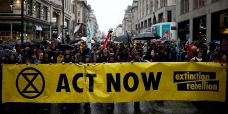 تصاویر، فعالان محیط زیست این بار در منطقه اقتصادی لندن تجمع کردند
